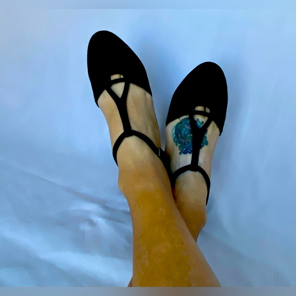 Size 8.5 black T-Strap with 2” Cuban heel.  Excellent condition.  Worn once